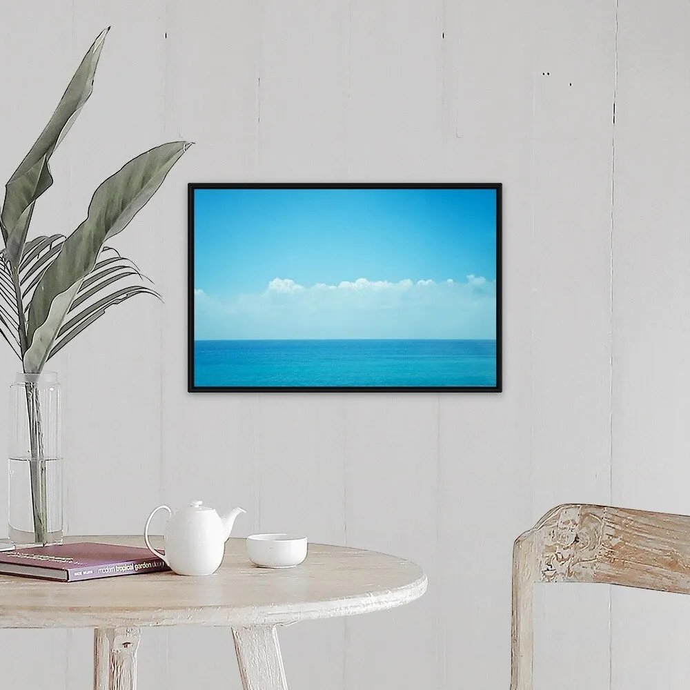 "Blue ocean with sky and clouds." Black Float Frame Canvas Art